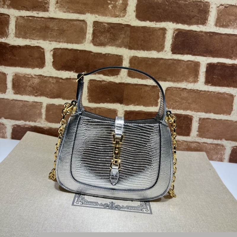 G*u*i top handle bags